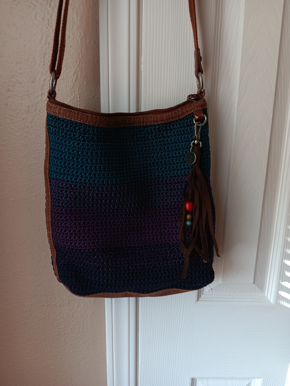 The SAK Woven Striped Crossbody Bag in Teal, Purple and Brown